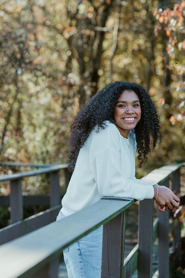 Cassopolis MI senior portraits surrounded by autumn trees and tall grasses