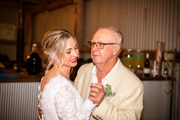 Nat and Darren together as the evening settles over their riverside wedding at Camp on Hunter, Elderslie, Hunter Valley