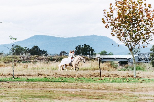 Nat and Darren's riverside wedding at Camp on Hunter, Elderslie — frame 4 from the Hunter Valley real wedding gallery