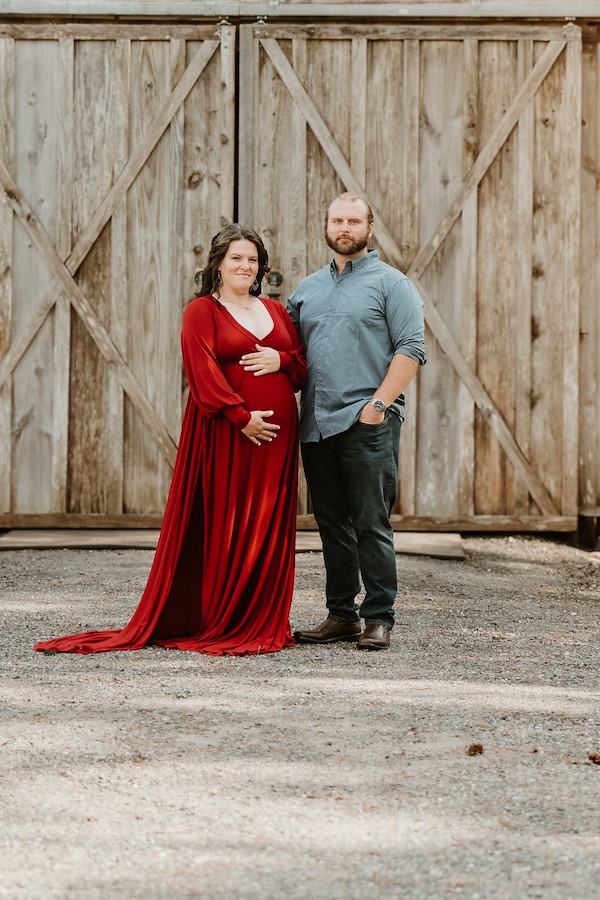 Mom and dad in front of the barn at Rustic Ridge, Deridder Louisiana
