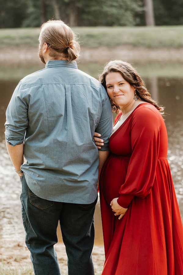 Mom and dad in front of the pond at Rustic Ridge, Deridder Louisiana