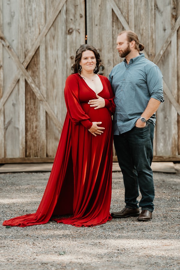 Mom and dad in front of the barn at Rustic Ridge, Deridder Louisiana