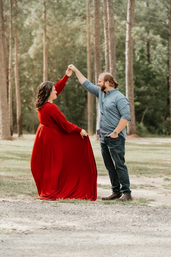 Dad twirls mom at Rustic Ridge, Deridder Louisiana